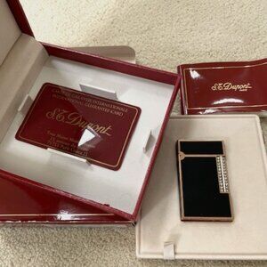 S.T. Dupont Line D lighter in black lacquer with gold trim and diamond-encrusted